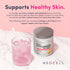NeoCell Beauty Collagen Infusion Grass-Fed Pink Lemonade Flavour powder, 200g food supplement, next to a glass with a pink drink.