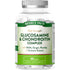 Glucosamine & Chondroitin Complex bottle with 60 tablets on a hand scale, showcasing nutritional support supplement.