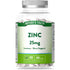 A hand holds a clear bottle of Nature's Truth Zinc 25mg, containing 60 vegan tablets.