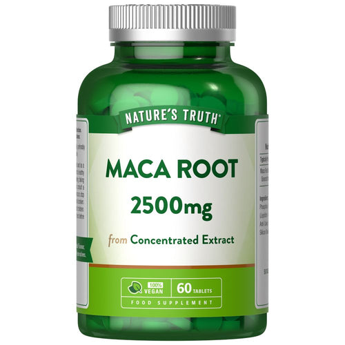 Image of a hand holding a bulk scale filled with Maca Root 2500mg tablets, 60 vegan tablets total.