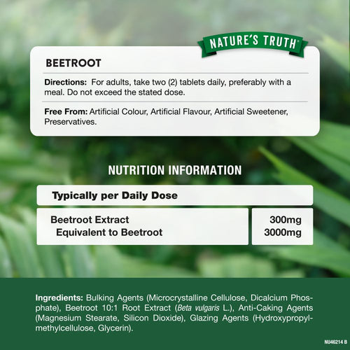 A hand holding a tablet labeled as Beetroot Extract 300mg, equivalent to 3000mg Beetroot, meant for consumption.