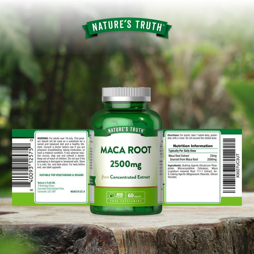 Hand holding a scale with a bottle of Maca Root 2500mg 60 Vegan Tablets, showcasing supplement size and packaging.