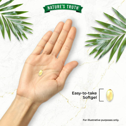 A yellow softgel rests on a human hand, alongside a close-up of an 'Easy-to-take Softgel' label.