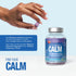 A hand holds a single purple gummy, offering 180mg of Elemental Magnesium.