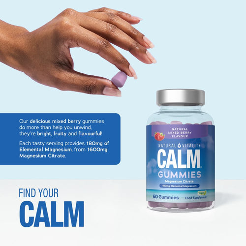 A hand holds a single purple gummy, offering 180mg of Elemental Magnesium.