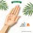 A hand holds an orange gummy near the words 'Vegan friendly gummies' and another orange gummy.